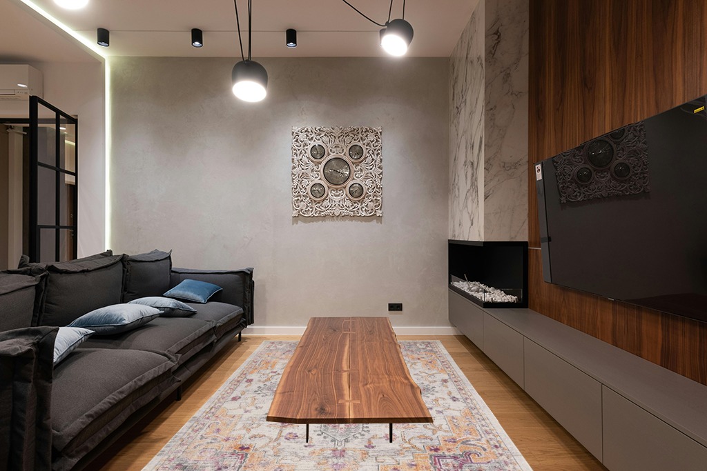 SAFAVIEH Madison Collection Area Rug - 6' x 9', Beige & Orange, Boho Chic Medallion Distressed Design, Non-Shedding & Easy Care, Ideal for High Traffic Areas in Living Room, Bedroom (MAD473E) in Dark Wood Living Room with Black Couch