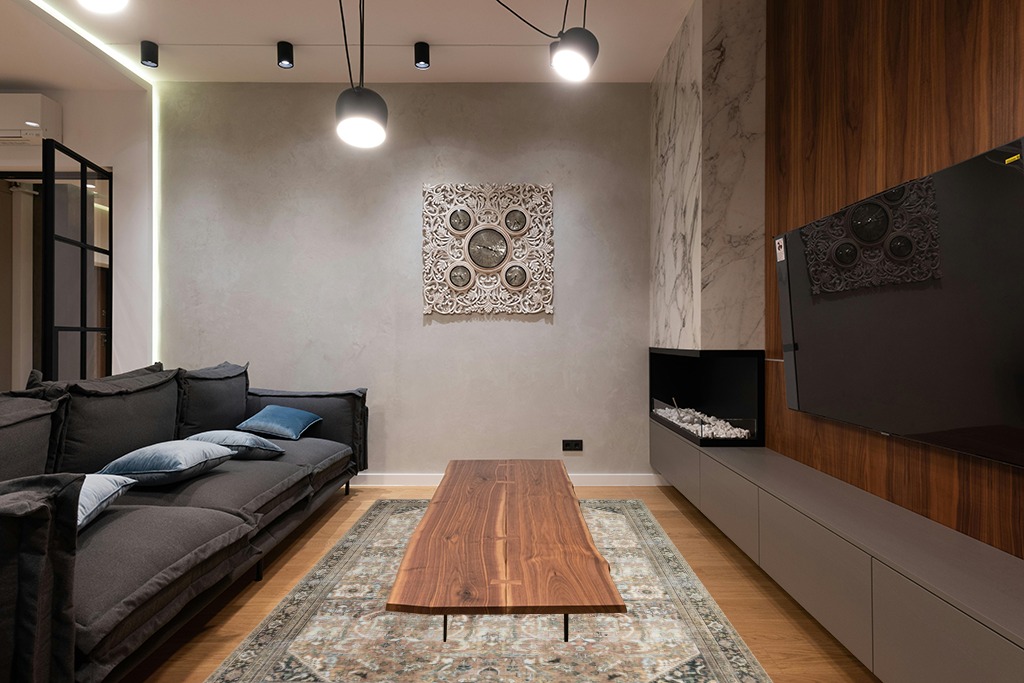 Modern living room rug ideas in Dark Wood Living Room with Black Couch