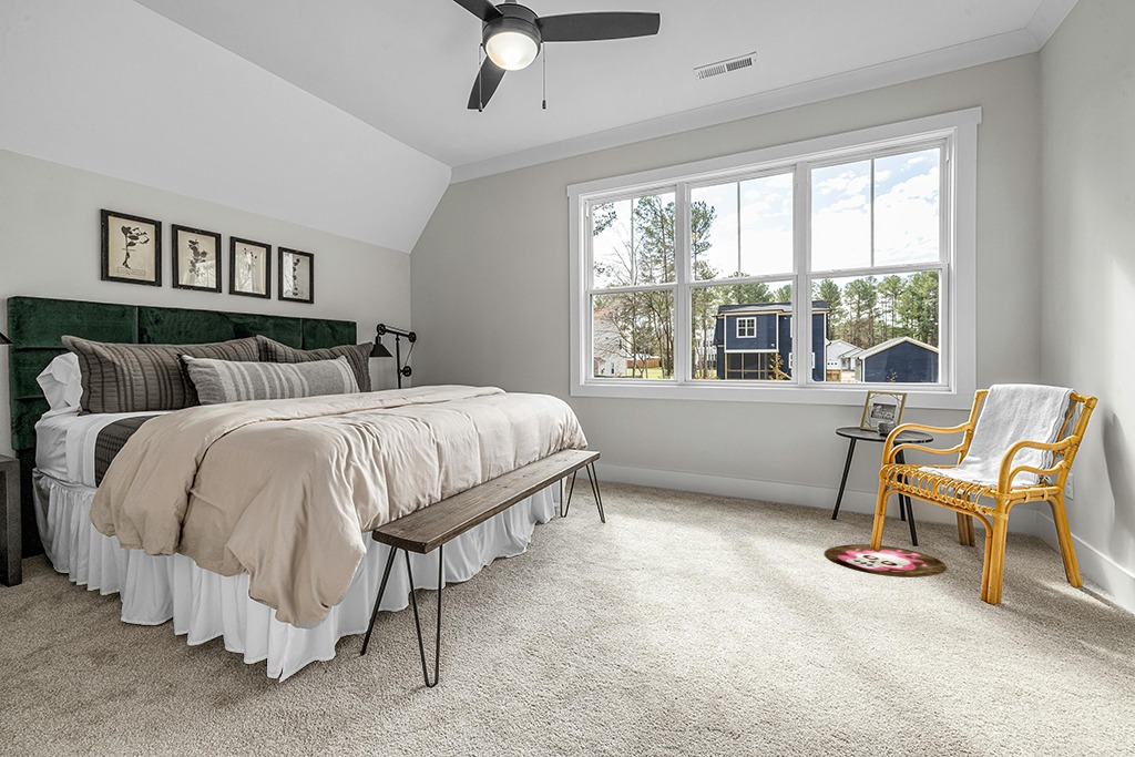 Round rug bedroom ideas in Grey Traditional Bedroom with King Bed