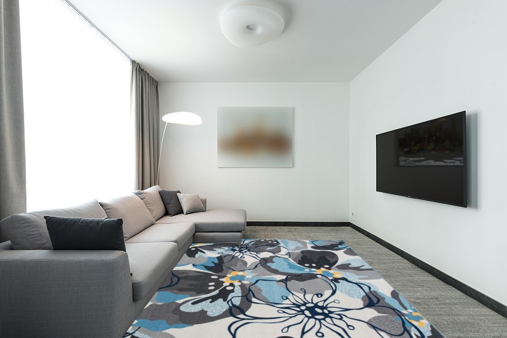 Rug over carpet ideas in Modern Living Room with Grey Couch