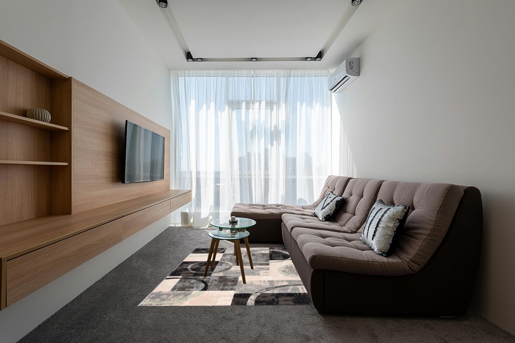 Are black rugs a bad idea in Grey Living Room with Brown Couch