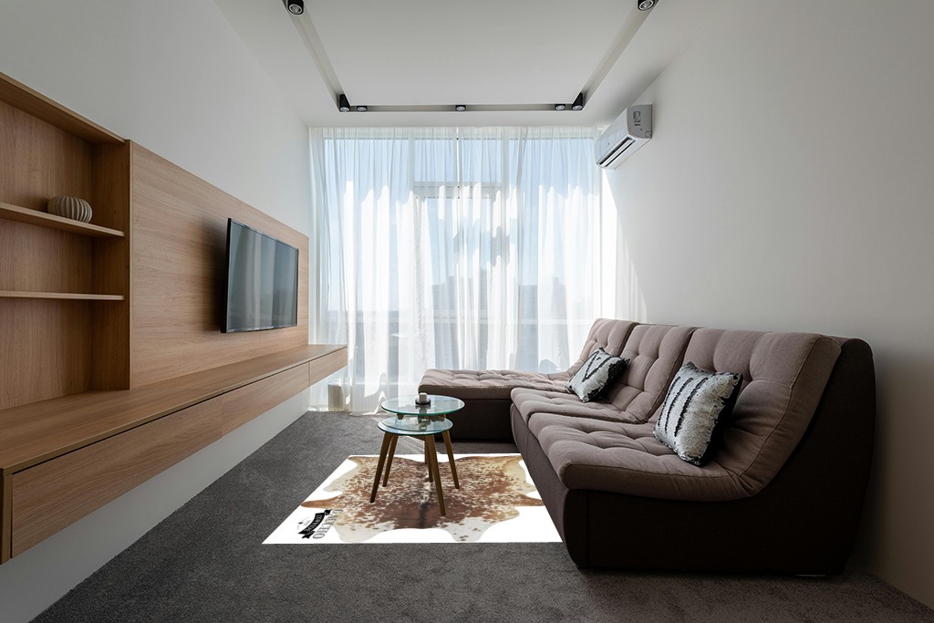 Cowhide rug decor ideas in Grey Living Room with Brown Couch