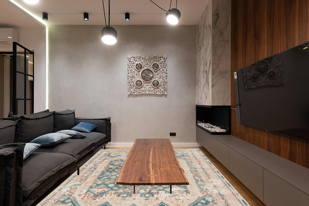 Green rug ideas in Dark Wood Living Room with Black Couch