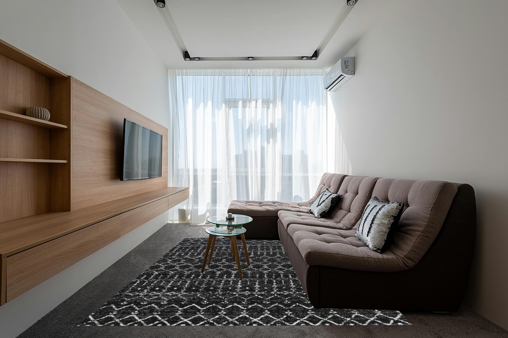 Are black rugs a bad idea in Grey Living Room with Brown Couch