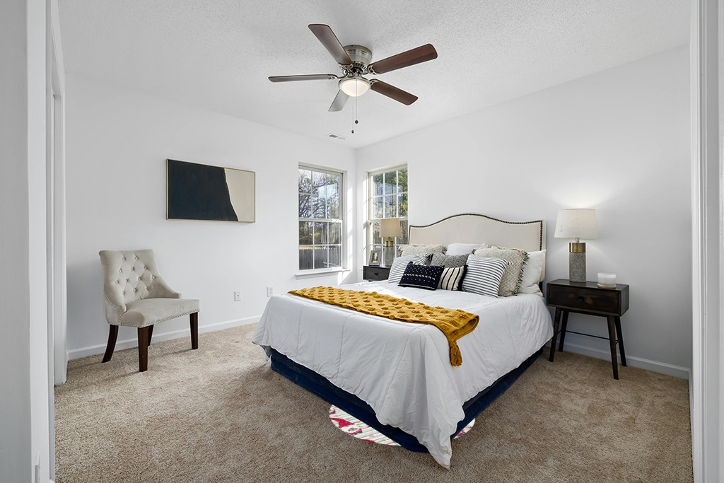 Rug over carpet ideas in White and Yellow Modern Bedroom