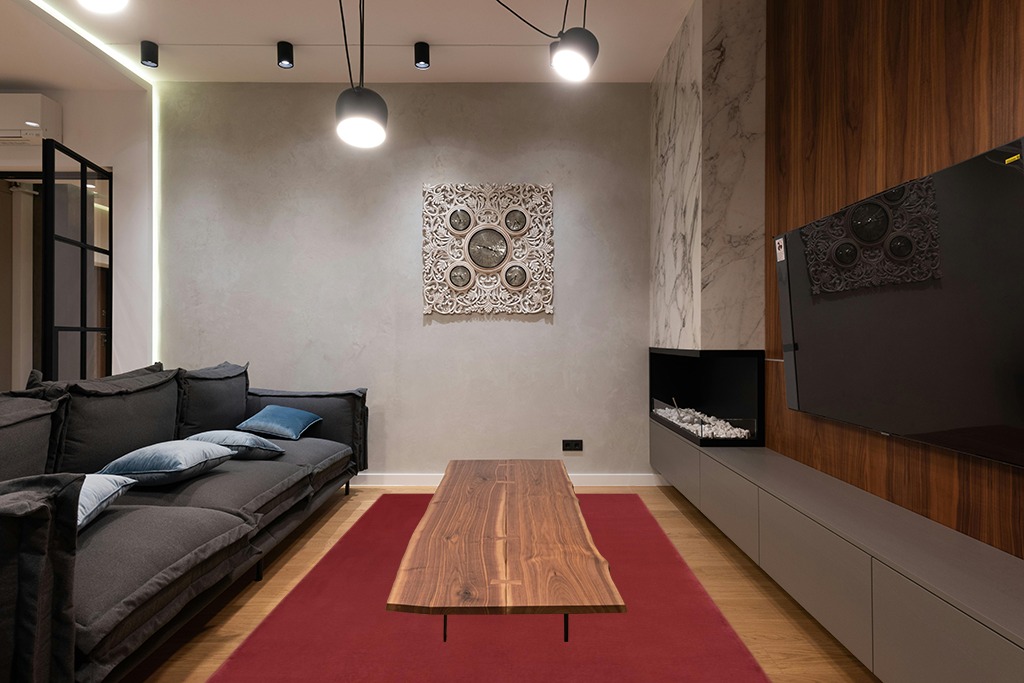Nourison Essentials Indoor/Outdoor Brick Red 6' x 9' Area-Rug,Easy-Cleaning, Non Shedding, Bed Room, Living Room, Dining Room, Backyard, Deck, Patio (6x9) in Dark Wood Living Room with Black Couch