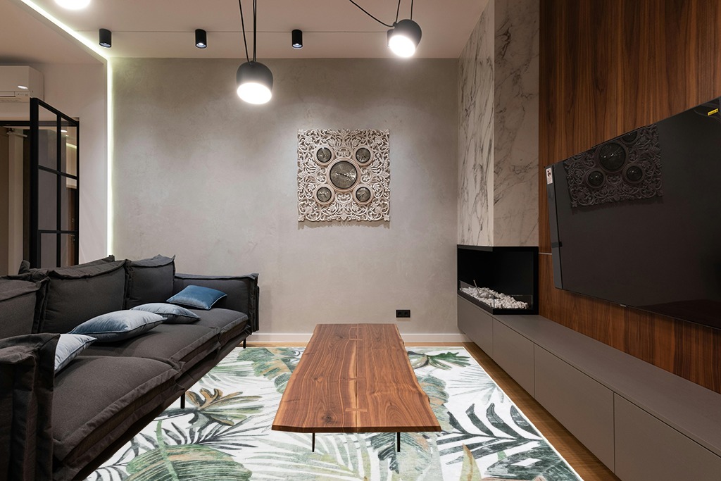 Grey room rug ideas in Dark Wood Living Room with Black Couch