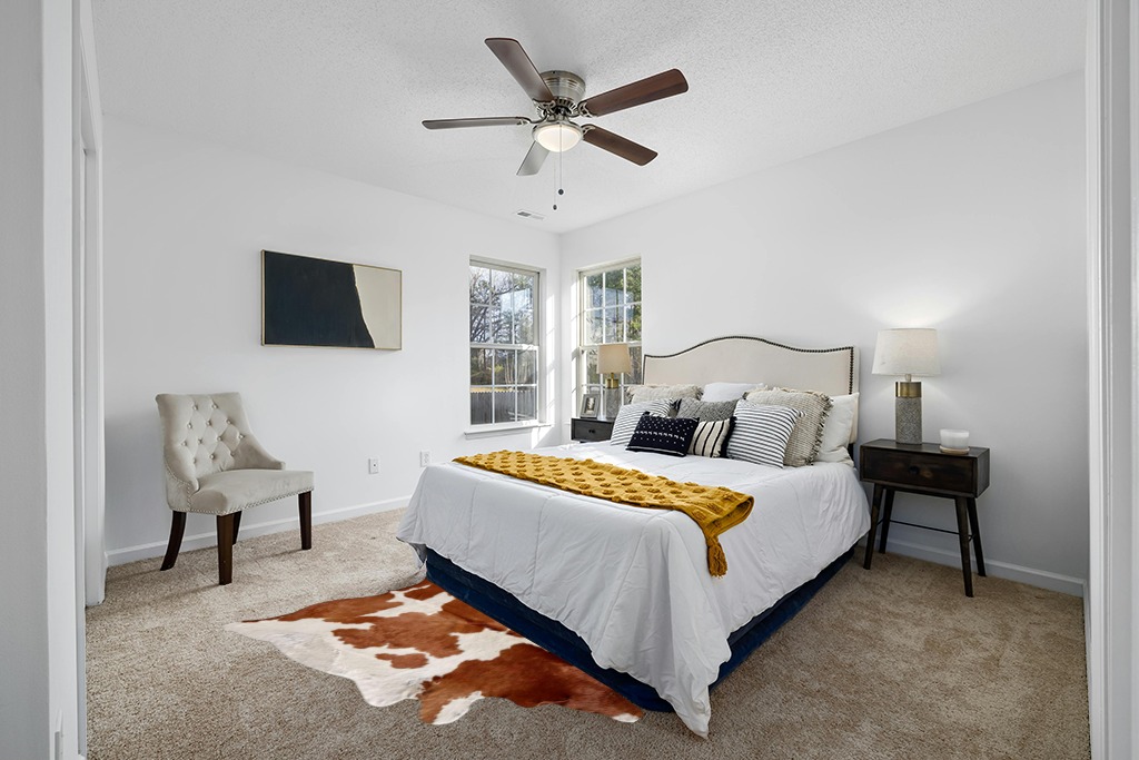 Cowhide rug in bedroom ideas in White and Yellow Modern Bedroom