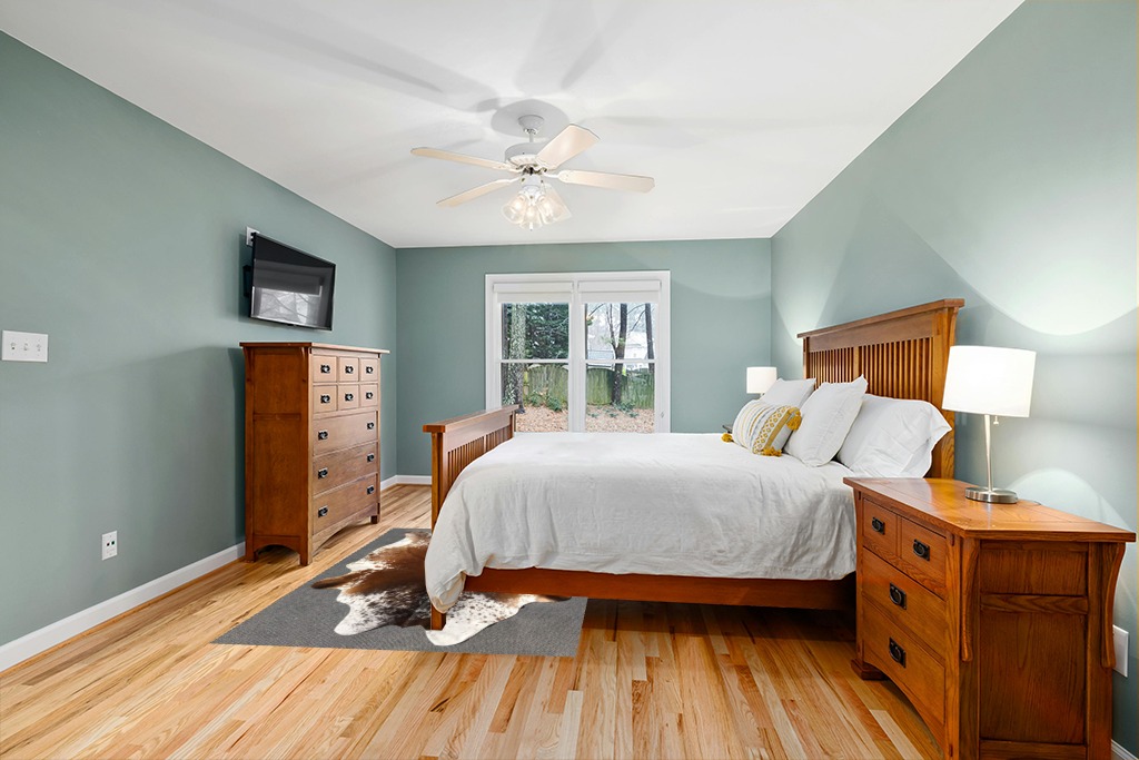 Cowhide rug in bedroom ideas in Teal and Orange Wood Bedroom