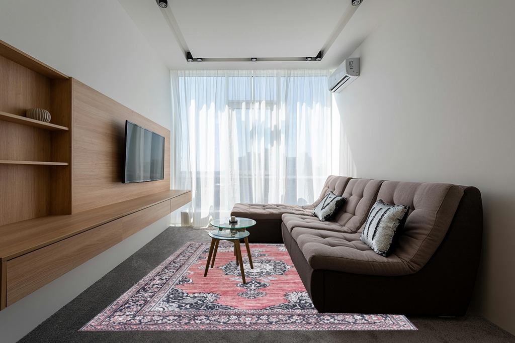 Rugs on grey carpet ideas in Grey Living Room with Brown Couch
