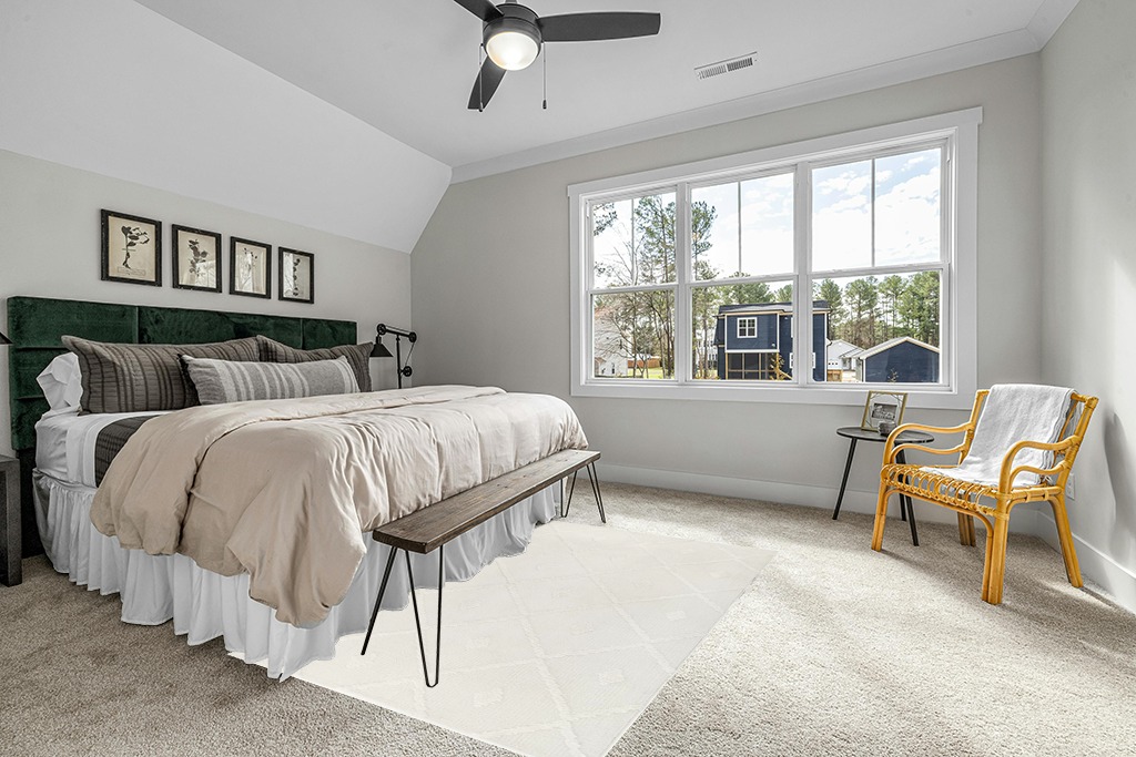 Rug on carpet bedroom ideas in Grey Traditional Bedroom with King Bed