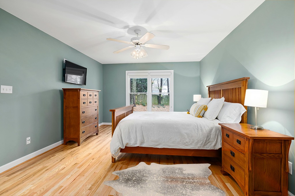 Cowhide rug in bedroom ideas in Teal and Orange Wood Bedroom
