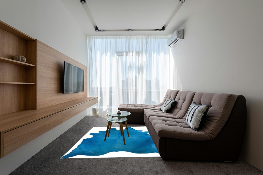 Cowhide rug decor ideas in Grey Living Room with Brown Couch