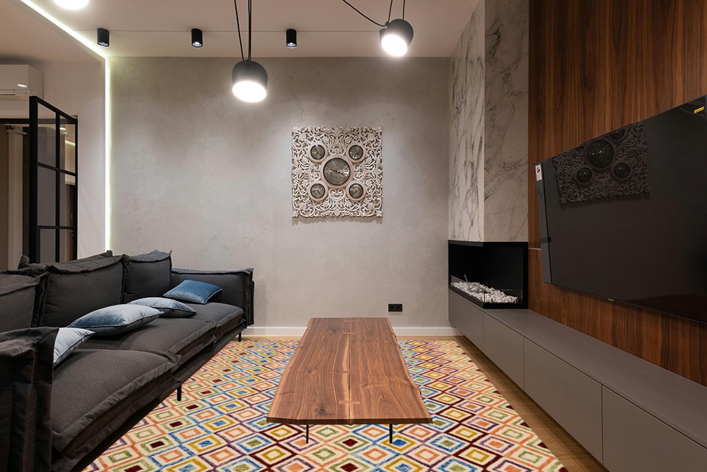 Yellow rug ideas in Dark Wood Living Room with Black Couch