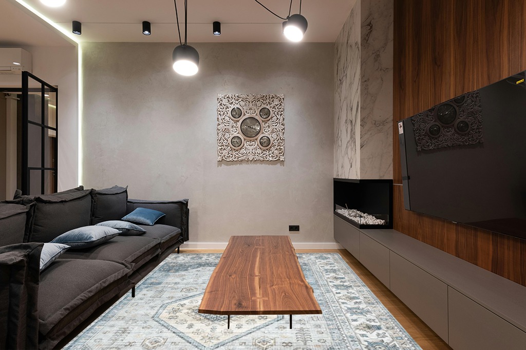 Large rug ideas in Dark Wood Living Room with Black Couch