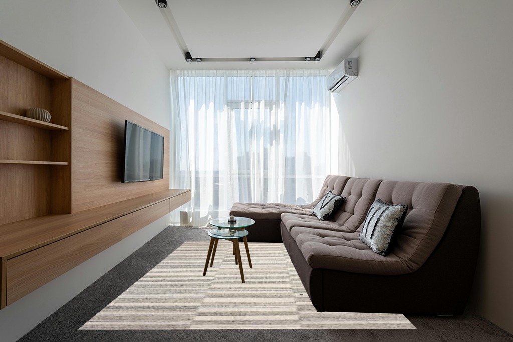 Loloi Magnolia Home by Joanna Gaines x Rae Stone/Ivory 7'-9" x 9'-9" Area Rug in Grey Living Room with Brown Couch