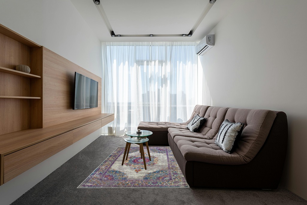 Rugs on grey carpet ideas in Grey Living Room with Brown Couch