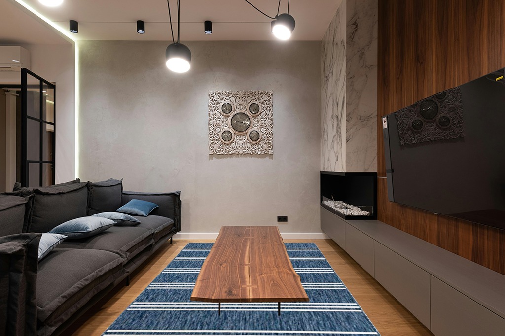 Unique Loom Jill Zarin Outdoor Collection Area Rug - Anguilla (6' 1'' x 9' Rectangle, Blue/ Ivory) in Dark Wood Living Room with Black Couch