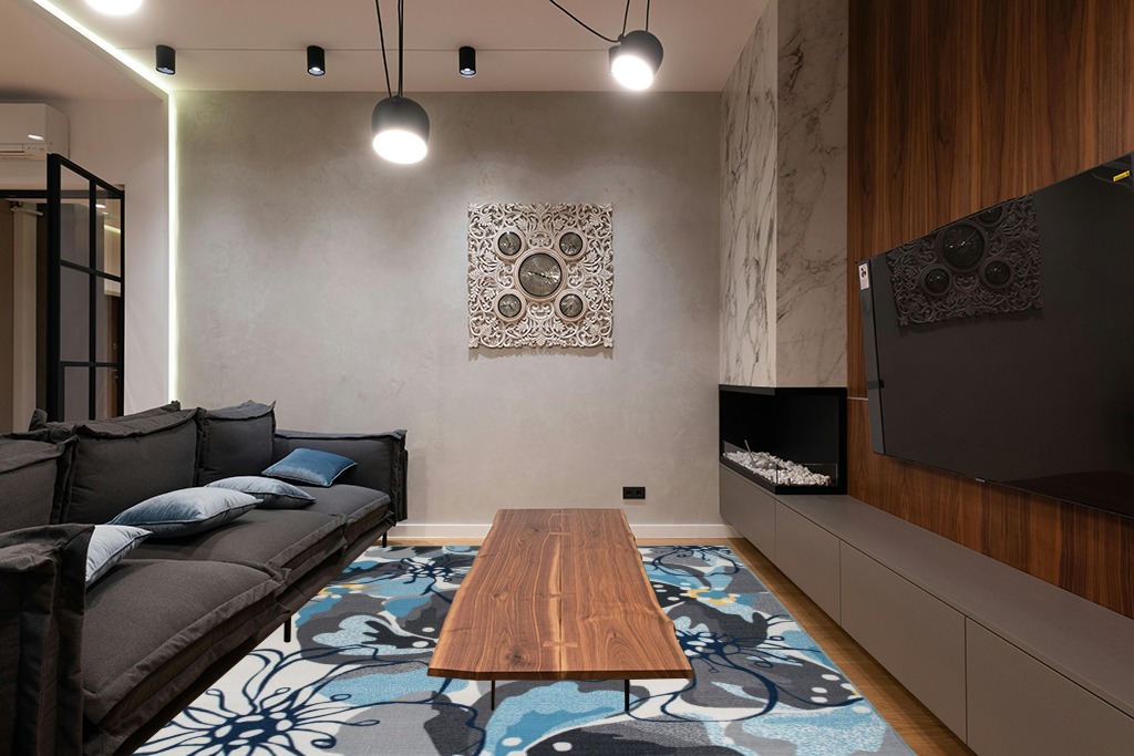 Grey room rug ideas in Dark Wood Living Room with Black Couch