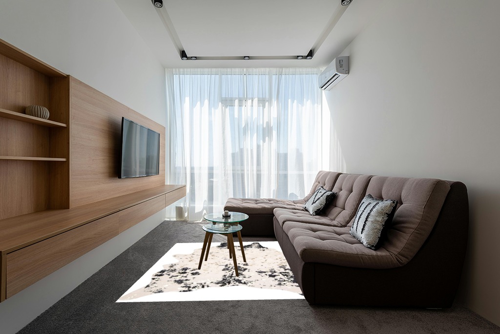 Cowhide rug decor ideas in Grey Living Room with Brown Couch