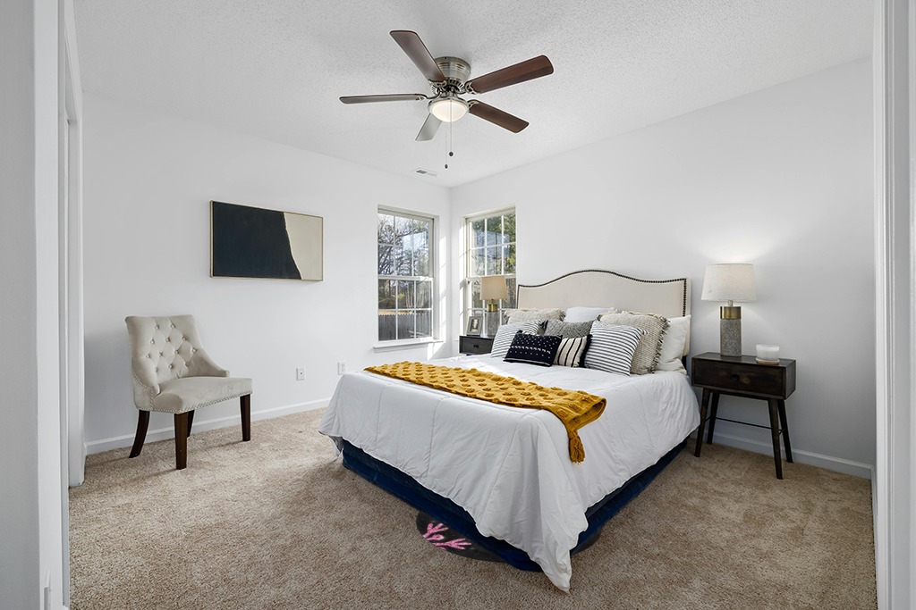 Rug over carpet ideas in White and Yellow Modern Bedroom